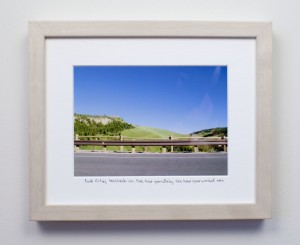 framed photograph, taken from car while driving across USA, with title handwritten on matt