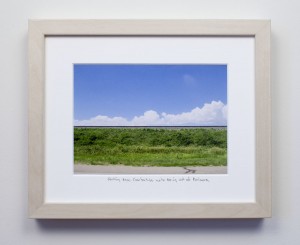 framed photograph, taken from car while driving across USA, with title handwritten on matt