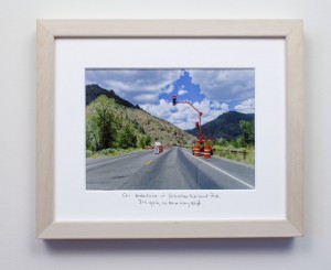 framed photograph, taken from car while driving across USA, with title handwritten on matt