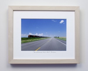 framed photograph, taken from car while driving across USA, with title handwritten on matt