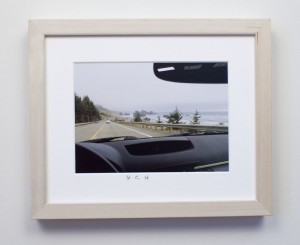 framed photograph, taken from car while driving across USA, with title handwritten on matt