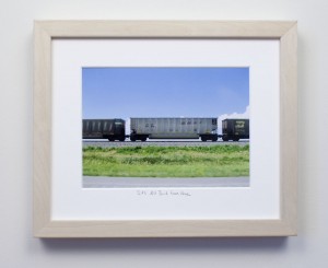 framed photograph, taken from car while driving across USA, with title handwritten on matt