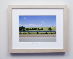 framed photograph, taken from car while driving across USA, with title handwritten on matt