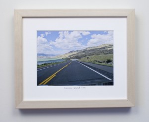 framed photograph, taken from car while driving across USA, with title handwritten on matt