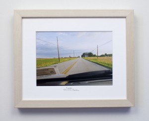 framed photograph, taken from car while driving across USA, with title handwritten on matt